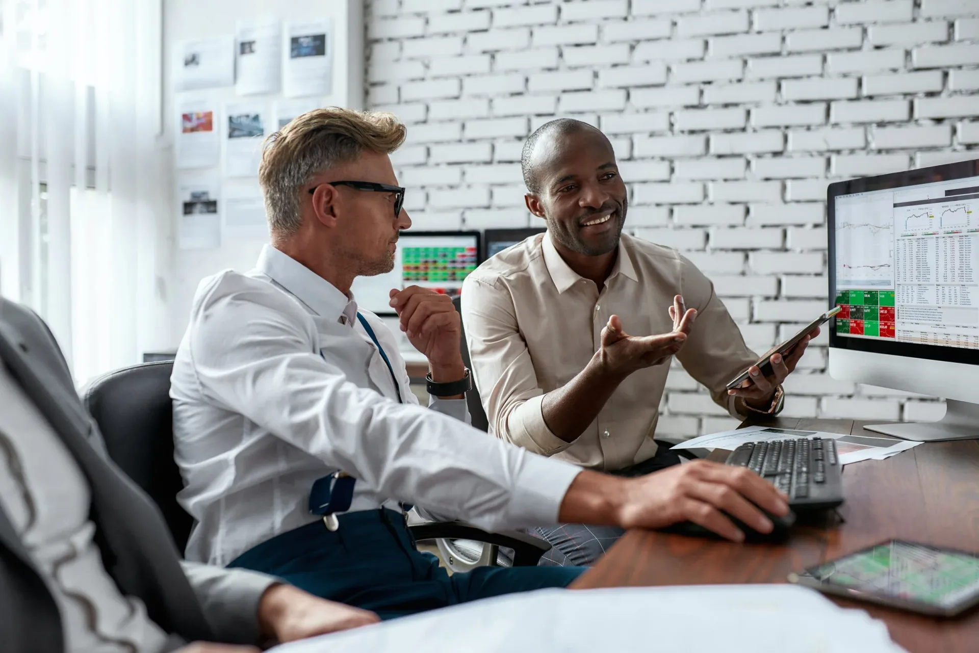One-on-one coaching at a trading desk